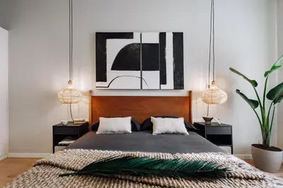 a living room with a couch and a tv at Feshi - 3 bedrooms in Eixample Dreta in Barcelona