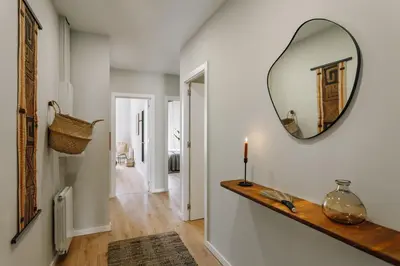a bathroom with a tub and a sink and a toilet at Feshi - 3 bedrooms in Eixample Dreta in Barcelona