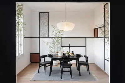 a living room with a couch and a table at Haku - 3 bedrooms in Eixample Dreta in Barcelona