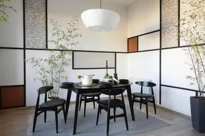 a bedroom with a bed with two books on it at Haku - 3 bedrooms in Eixample Dreta in Barcelona