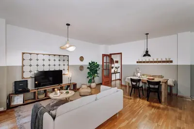 a bedroom with a large bed with two lamps at Cortijo - 2 bedrooms in Gràcia in Barcelona