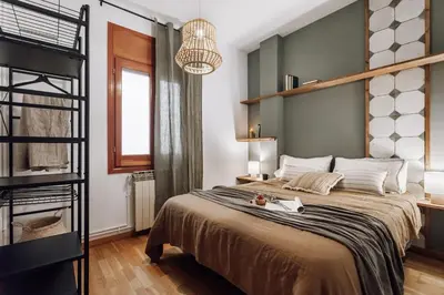 a bathroom with a white sink and a shower at Cortijo - 2 bedrooms in Gràcia in Barcelona