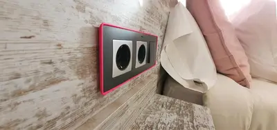 a speaker on a wall next to a couch at DreamKeys Barcelona City in Barcelona