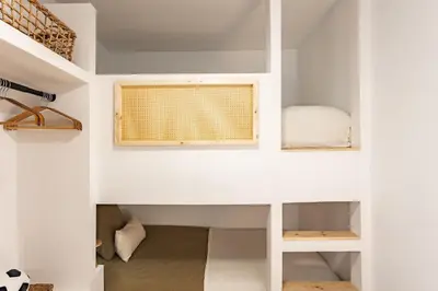 a room with a bunk bed in a house at Barcelona Central Charm with Mediterranean Vibes in Barcelona