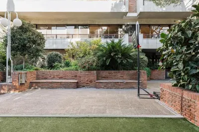 a brick bench in front of a building at Montseny - 2 bedroomd and terrace in Montseny in Barcelona