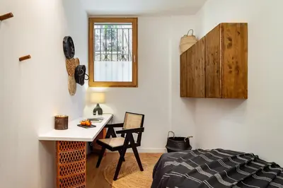 a bathroom with a sink and a toilet and a shower at Tinghir - 2 bedrooms and pool in Gràcia in Barcelona