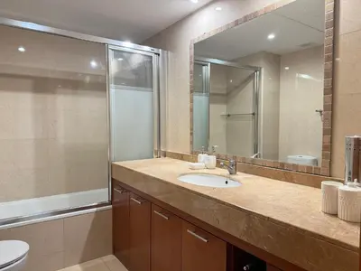 a bathroom with a sink and a mirror at Dúplex con encanto en Castelldefels in Castelldefels