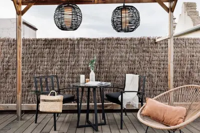 a group of plants in pots on a patio at Atacama - 1 bedroom in Eixample Esquerra in Barcelona