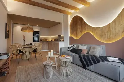 a mirror reflection of a bedroom with a bed at Lingga - 2 bedrooms and terrace in Gràcia in Barcelona