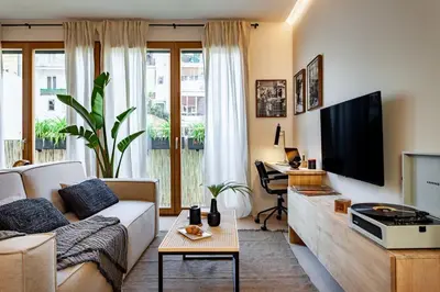 a dining room with a table and chairs at Sanur - 2 bedrooms in Gràcia in Barcelona