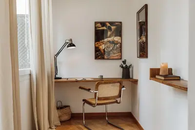 a living room with a couch and a tv at Yari - 3 bedrooms and terrace in Sant Gervasi in Barcelona