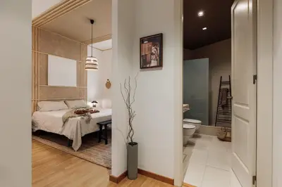 a small bedroom with a bed and a window at Yari - 3 bedrooms and terrace in Sant Gervasi in Barcelona