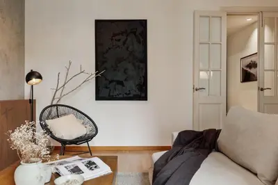 a dining room with a table with chairs and aendant light at Yari - 3 bedrooms and terrace in Sant Gervasi in Barcelona