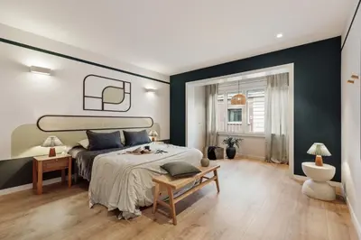 a dining room with a table and chairs at Kadikoy - 4 bedrooms and terrace in Sant Gervasi in Barcelona