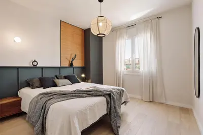 a bedroom with a bed and a desk in it at Katz - 3 bedrooms and terrace in Les Corts in Barcelona