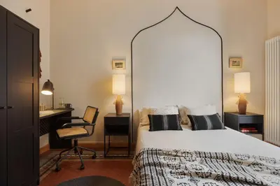 a living room with a couch and a table with candles at Amazzer - 3 bedrooms in Eixample Esquerra in Barcelona