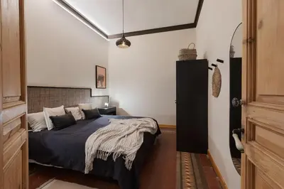 a bedroom with a large bed in a room at Amazzer - 3 bedrooms in Eixample Esquerra in Barcelona