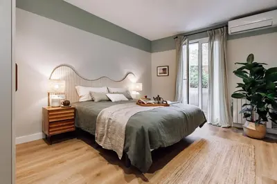 a hallway with a console table and a mirror at Laurel - 3 bedrooms in Sant Gervasi in Barcelona