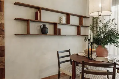 a living room with a couch and a table at Bayal - 2 bedrooms and balcony in El Putxet in Barcelona