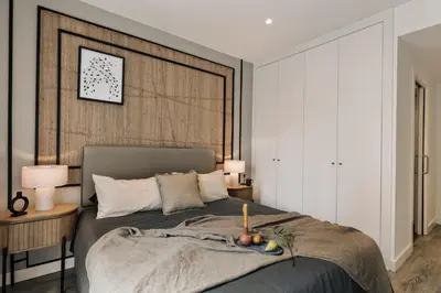 a living room with a desk and a couch at Elan - 2 bedrooms and balcony in Sant Gervasi in Barcelona