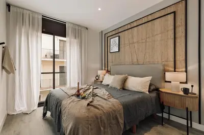 a living room with a couch and a table at Elan - 2 bedrooms and balcony in Sant Gervasi in Barcelona
