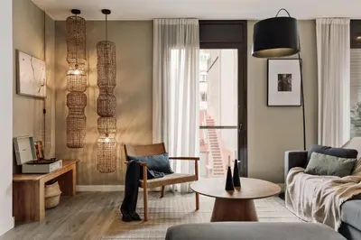 a dining room with a wooden table and chairs at Elan - 2 bedrooms and balcony in Sant Gervasi in Barcelona