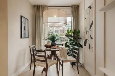 a bedroom with a bed and a desk and a mirror at Jabillos - 2 bedrooms and balcony in El Putxet in Barcelona
