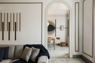 a dining room with a table and chairs at Kaftan - 5 bedrooms and balcony in Eixample Dreta in Barcelona