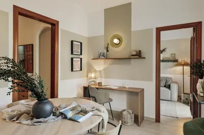 a dining room with a table and chairs at Nampi - 2 bedrooms and balcony in El Poblenou in Barcelona