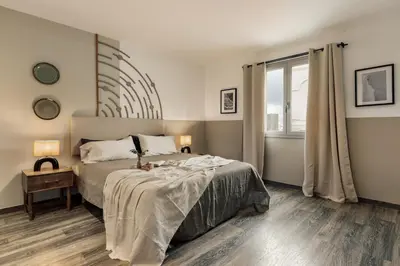a living room with a table and a couch at Tarra - 4 bedrooms and terrace in Sant Pere in Barcelona