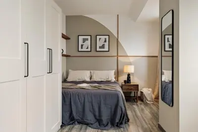 a bedroom with a large bed and a window at Tarra - 4 bedrooms and terrace in Sant Pere in Barcelona