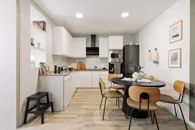 a bedroom with a bed and a mirror at Tulum - 3 bedrooms and balcony in Gràcia in Barcelona