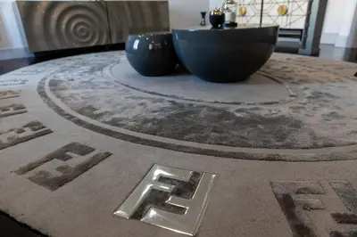 a table with two blue bowls on top of it at Paseo de Gracia Icon Apartment in Barcelona