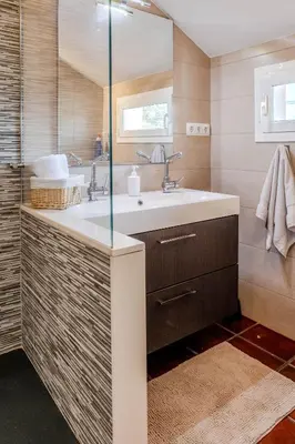 a bathroom with a sink and a mirror at Yasmine Casas Barcelona in Olivella