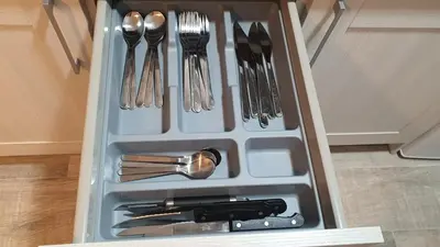 a drawer filled with utensils in a kitchen at Vallgorguina Uno in Vallgorguina