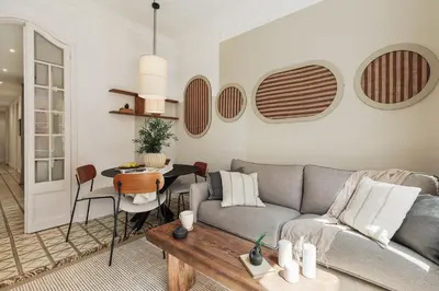 a room with a bed and a door leading into a bedroom at Loma - 3 bedrooms and office in Eixample Esquerra in Barcelona