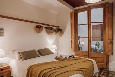 a living room with a table and a couch at Alajar - 3 bedrooms in St Pere Sta Caterina in Barcelona