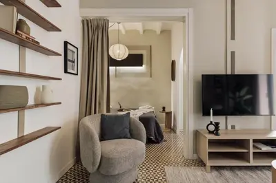 a dining room with a table and chairs at Tiqui - 1 bedroom and balcony in Vila de Gràcia in Barcelona