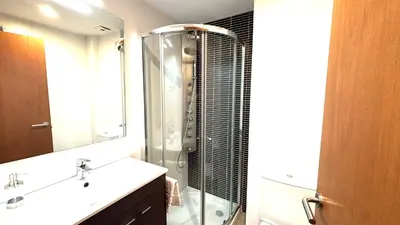 a bathroom with a shower and a sink and a toilet at Dúplex zona olimpica by Prestigi in Terrassa