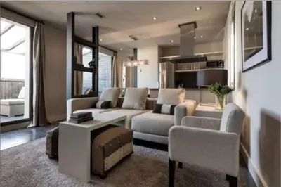 a living room with a couch and a table at Stay Unique Apartment Minerva in Barcelona