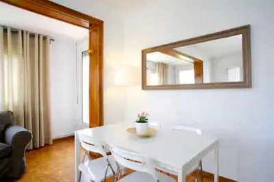 a bathroom with a sink and a glass shower at S4D Villarroel Clinic in Barcelona
