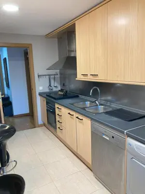 a kitchen with a sink and a stove at Fantastic apartment in Barberà in Barbera del Valles