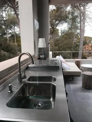 a kitchen counter with a sink and a window at Independent duplex in a stately villa in Sant Cugat del Vallès