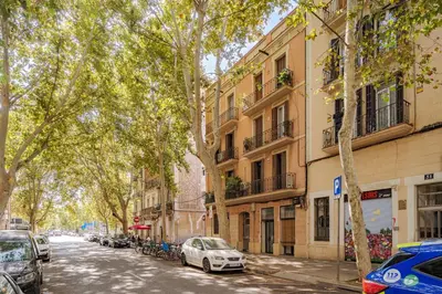 a street with cars parked on the side of a building at GuestReady- Lovely apartment in Barcelona in Barcelona