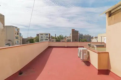 a balcony with a view of a city at GuestReady- Lovely apartment in Barcelona in Barcelona