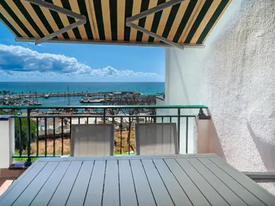 a balcony with a view of the ocean at Horizon Views by Hello Homes Sitges in Sitges