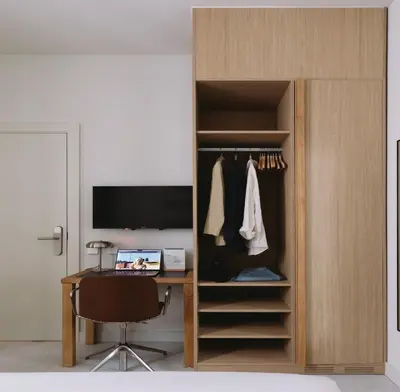 a bedroom with a bed and a couch at Outsite Barcelona in Barcelona