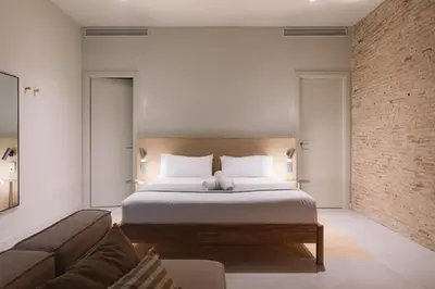 a living room with a couch and a table at Outsite Barcelona in Barcelona