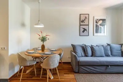 a living room with a table and a couch at 4329 - AB Eixample Centric in Barcelona