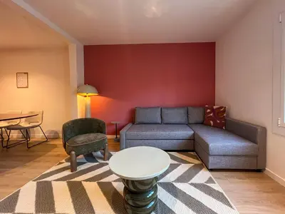 a living room with a couch and a table at Stay U-nique Apartment Castanyer II in Barcelona